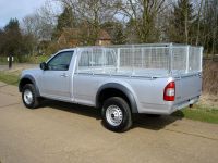 Isuzu Rodeo Pick Up Conversion - Cages with rear barn door. Calvanised steel toolbox. Full width alloy toolbox mounted on body to allow for full load length. 